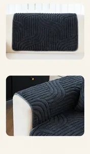 Detail of dark grey plush sofa cover with 3D wave texture and reinforced edges