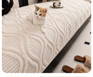 Detailed view of plush off-white sofa cover with textured 3D wave pattern and thick faux fur