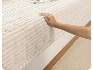 Close-up of plush striped bay window mat showing thick material and soft texture