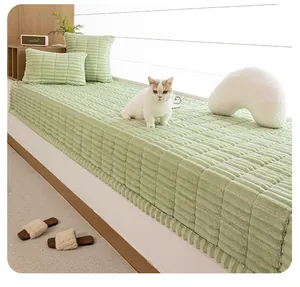 Detail of light green thick corduroy bay window cushion with soft striped velvet texture