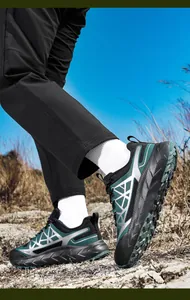 Macro view of breathable mesh texture and grippy thick sole on outdoor trail running shoes