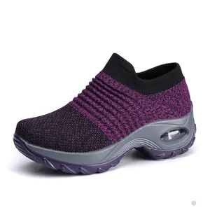 Purple air-cushioned platform rocker sneakers with breathable mesh slip-on design
