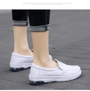 Detail of white nursing shoes featuring a built-in air cushion for shock absorption