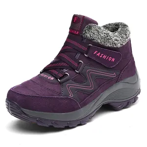 Purple winter snow boot for women with warm faux fur lining and velcro strap