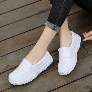 Comfortable white leather slip-on work shoes for women with blue air cushion sole
