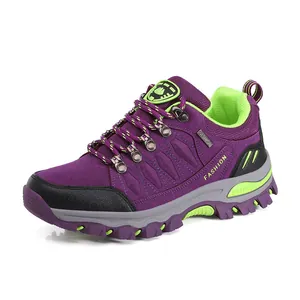 Purple and green high-top hiking boots with non-slip rubber soles for outdoor sports