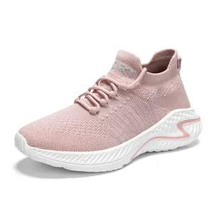Pink flyknit breathable couple sneakers with white cushioned sole and lace-up design