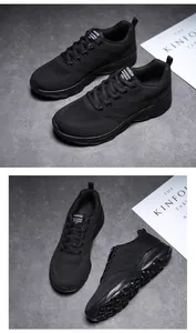 Dettaglio di scarpe da corsa in maglia nera traspirante con suola in gomma spessa