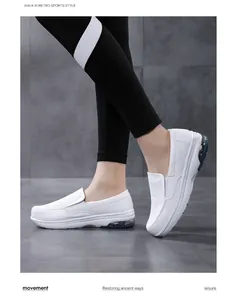 Détail des baskets blanches sans lacets avec semelle à coussin d'air et finition cuir