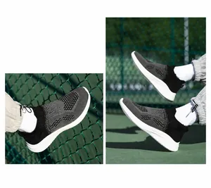 Detailed close-up of grey breathable knit mesh upper and thick white cushioned sole