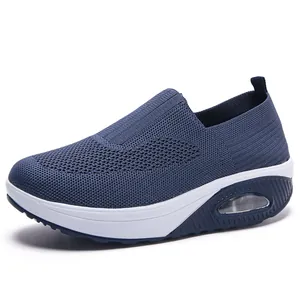 Navy blue breathable knit platform sneaker with air cushion sole and slip-on style