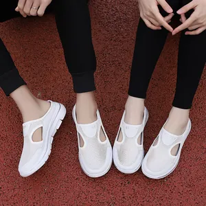 Detailed top view of white breathable mesh slip-on sports sandals for couples