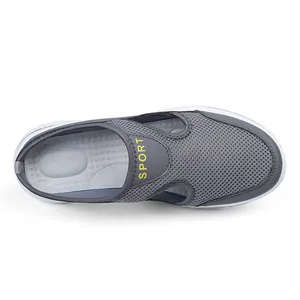 Detailed top view of grey breathable mesh slip-on shoe with white platform sole