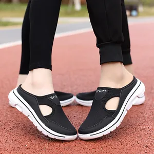 Breathable black mesh slip-on sport mules with thick white rubber soles for walking