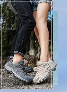 Detail of durable anti-slip rubber soles on breathable mesh outdoor hiking shoes