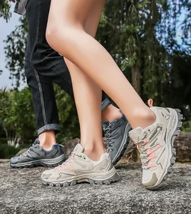 Close-up of durable rubber grip soles and mesh upper on outdoor hiking shoes