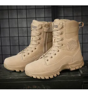 Detail of sand-colored tactical boots showing breathable mesh and side zipper closure