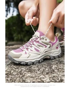 Detail shot of purple breathable hiking shoe with non-slip rubber sole and outdoor laces