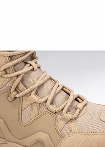 Detail of tactical boot lacing system with durable fabric loops and desert suede