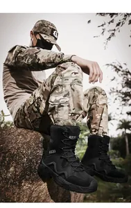 Close-up of black tactical boots with AS33 logo and durable lace-up design in outdoors