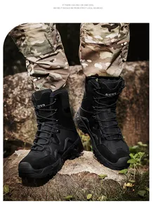 Detail of durable black tactical boots with nubuck leather and thick rubber soles