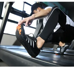 Flexible barefoot sports shoe sole detail showing grip and flexibility on treadmill