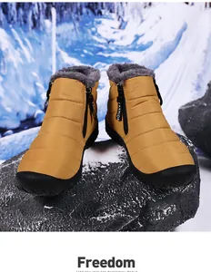Detail of waterproof ginger snow boots with thick grey faux fur lining and side zipper