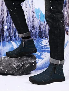 Detail of men's winter snow boot featuring fleece lining and side zipper with fashion logo