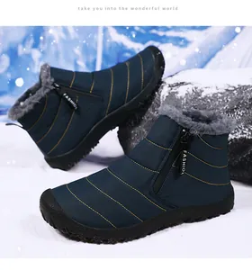 Detail of navy blue winter boot featuring fashion zipper and thick faux fur lining