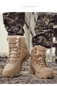 Detail of khaki tactical boots with thick fleece lining on camouflage trousers
