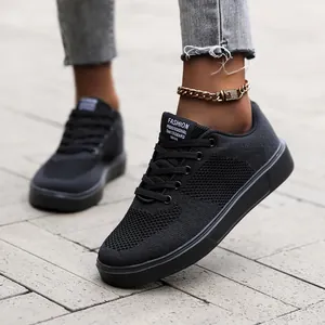 Men's black breathable fly-knit sneakers with comfortable flat sole and lace-up design
