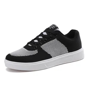 Men's breathable knit fashion skateboard shoes in classic black and white style