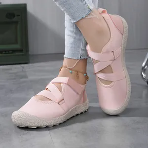 Pink quick-dry water shoes with cross straps and non-slip rubber sole for beach and yoga