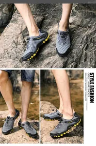 Macro view of breathable mesh outdoor water shoes with anti-slip yellow rubber soles