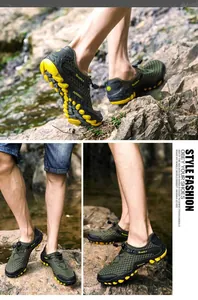 Detail of outdoor water shoes with breathable mesh and anti-slip yellow rubber sole
