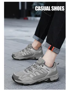 Dettagli di scarpe da trekking grigie con mesh traspirante e pelle per sport all'aperto