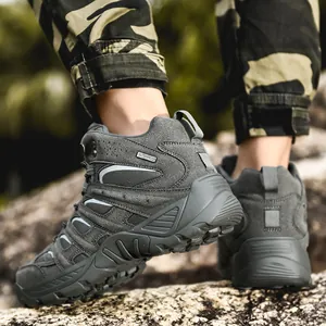 Waterproof dark grey mid-cut hiking boots for men with durable rubber lug soles for outdoors