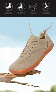 Detail showing the wide toe box and non-slip rubber sole of the hiking shoe