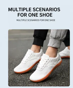 Detail of white mesh outdoor barefoot sneakers with durable orange rubber traction sole