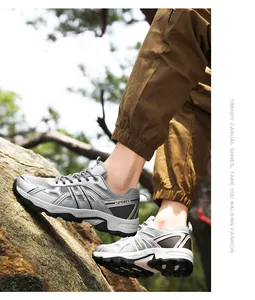 Close-up of gray outdoor hiking shoes with breathable mesh and anti-slip rubber sole