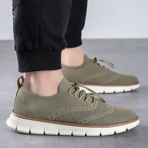Olive green breathable flyknit casual men's sneakers with thick white soles and drawstrings