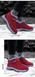 Detail showing plush grey faux fur lining and anti-slip thick rubber sole for snow boots
