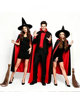 Three models wearing red and black Halloween cloaks with a witch hat and broom prop