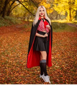 Detail of red and black reversible Halloween cloak showing high collar and fabric texture
