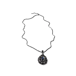 Detail of vintage teardrop necklace with blue crystals and dark gunmetal chain link