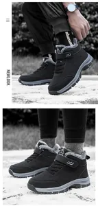 Detail of warm grey faux fur lining and velcro strap on black outdoor snow boots
