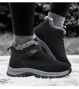 Detail of high-top winter snow boots with faux fur lining and anti-slip outdoor soles