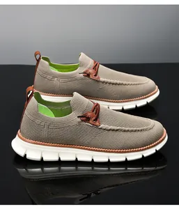Detail of khaki breathable mesh knit upper and thick white anti-slip sole on men loafers