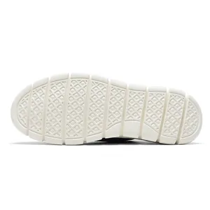 Close-up of beige breathable mesh loafer outsole with flexible anti-slip diamond texture