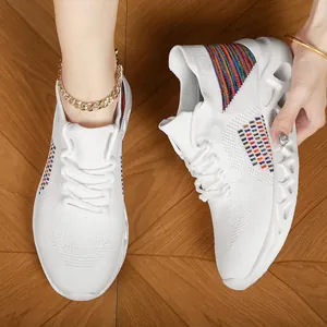 White breathable fly-knit sneakers with rainbow accents and geometric hollowed shock-absorbing sole